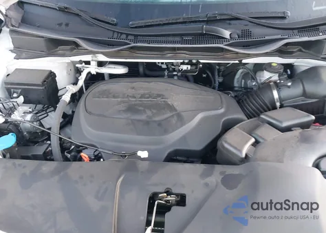 2023 Honda Odyssey Touring from USA, damaged, VIN 5FNRL6H87PB074135